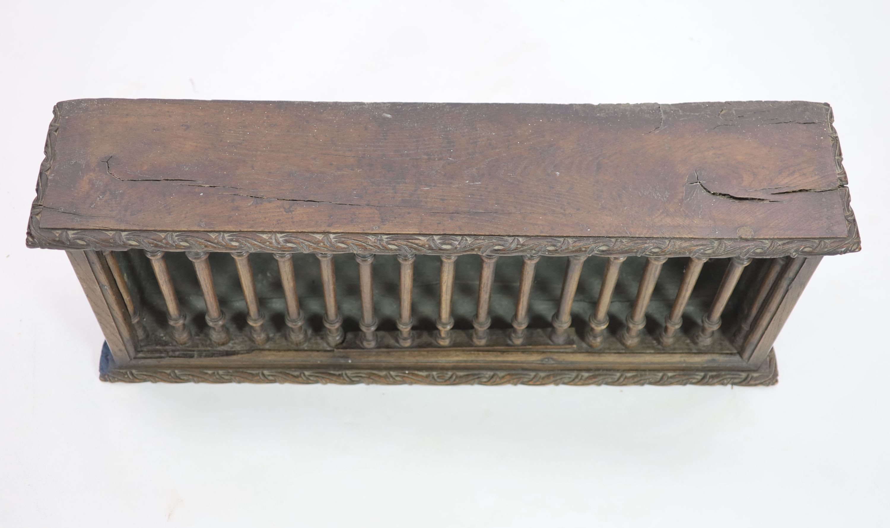 A 17th century oak food cupboard, W.106cm D.23cm H.43cm